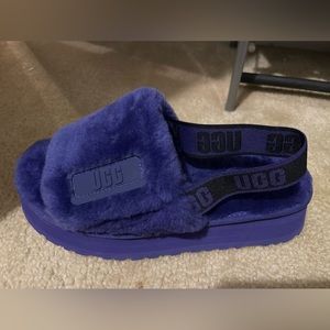 Purple never worn Uggs. Good for in or outdoors